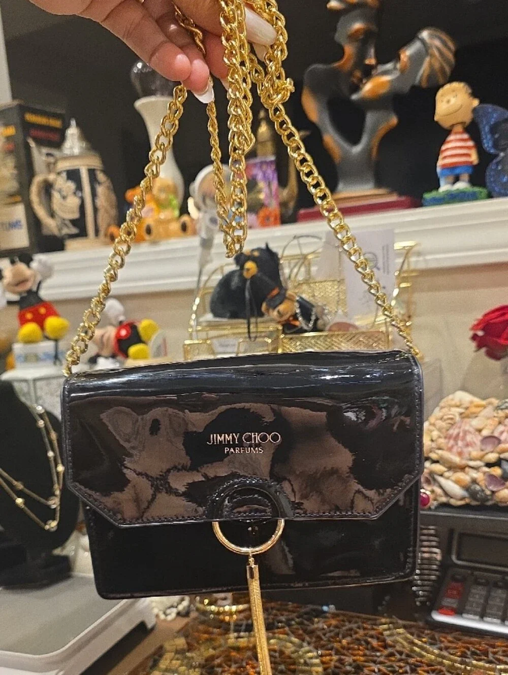 Jimmy Choo Black Patent Leather Crossbody with Gold Ring Tassel